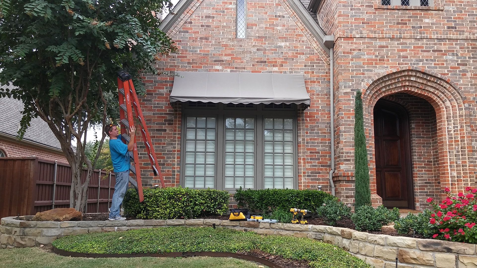 Residential window awning installation